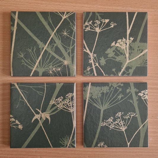 Limited-edition Wild Chervil ceramic coasters arranged to show their individual botanical pattern placement.