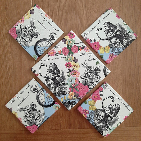 One-of-a-kind Alice in Wonderland ceramic set with four handmade coasters and matching bottle stand.