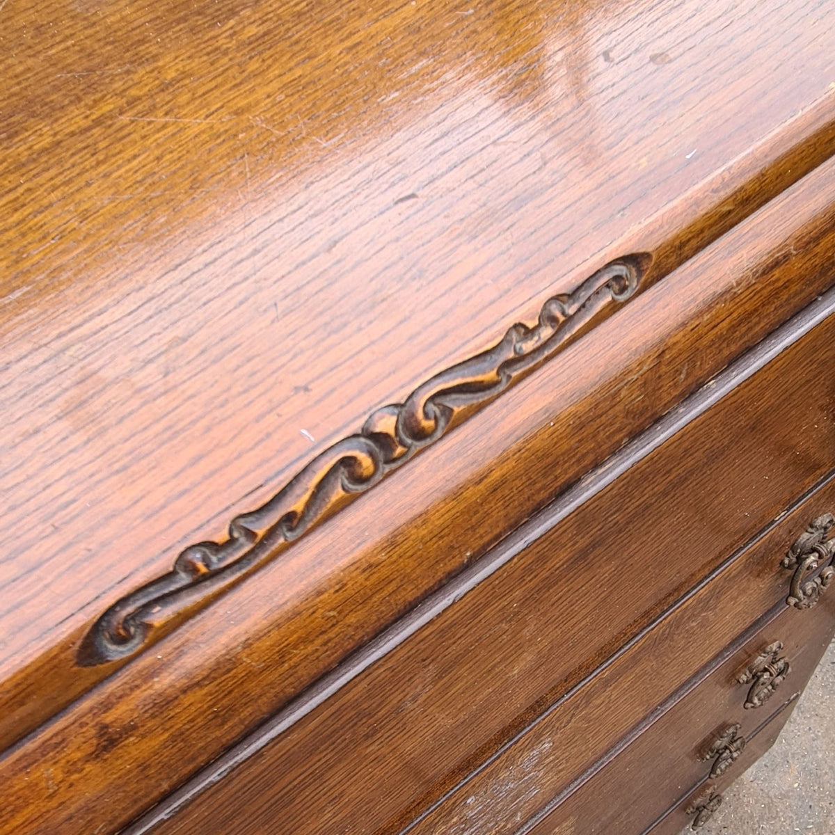 Close up of carved detail on vintage Beeanese mid-century five-drawer tallboy chest ready for a bespoke furniture transformation.