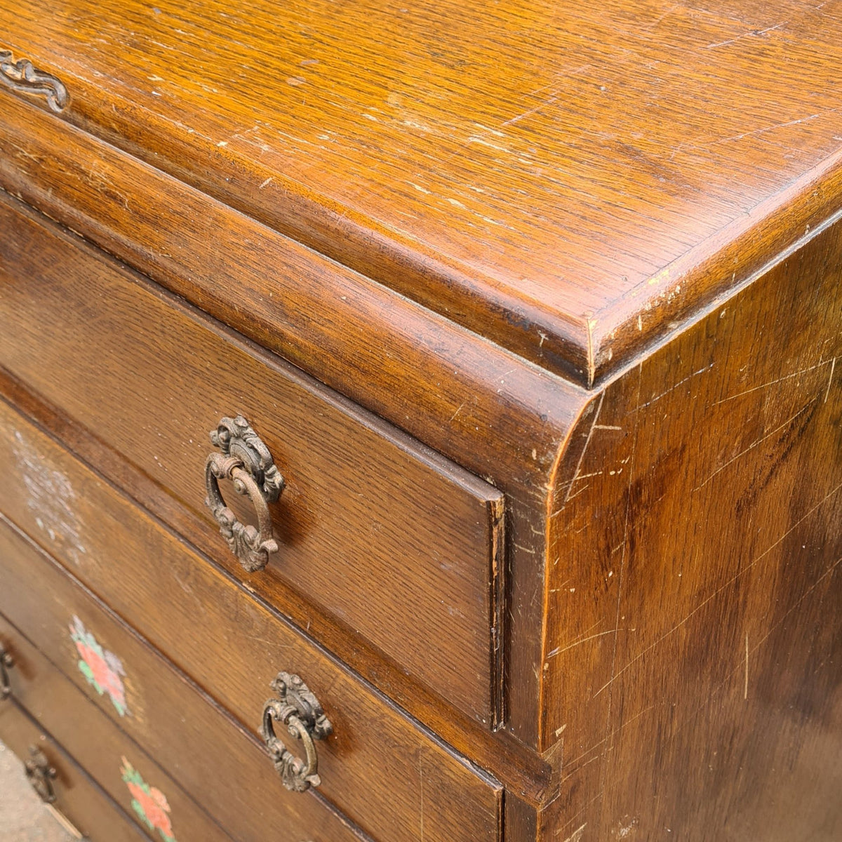 Curves on a vintage Beeanese mid-century five-drawer tallboy chest ready for a bespoke furniture transformation.