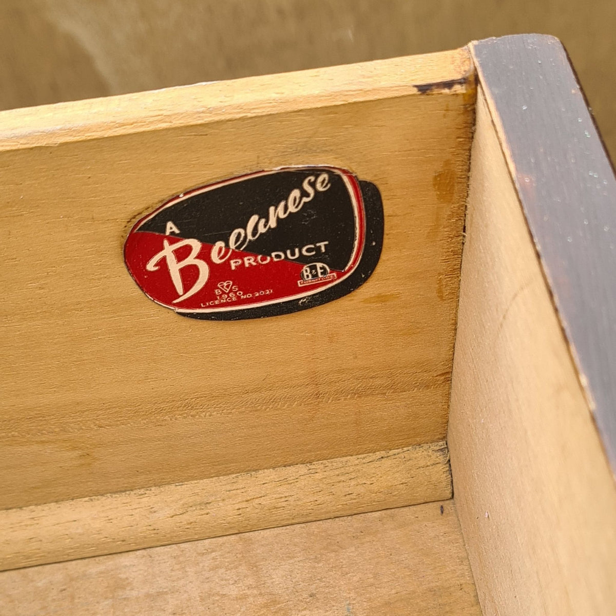Makers mark in drawer of vintage Beeanese mid-century five-drawer tallboy chest ready for a bespoke furniture transformation.