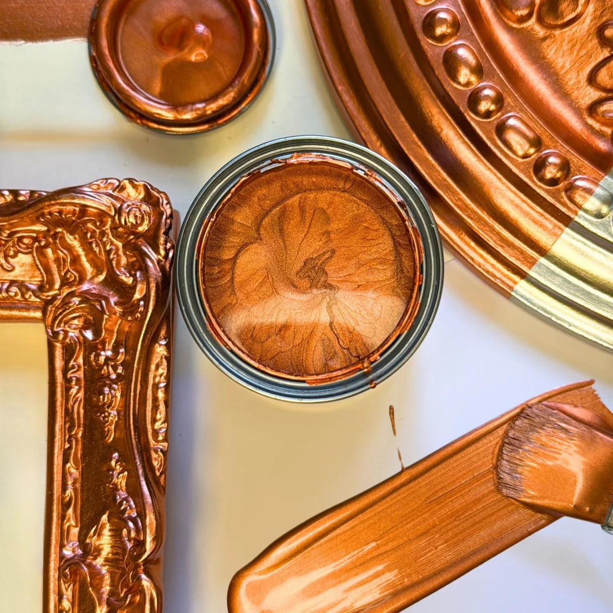 Guild Lane GILD Copper metallic paint used to highlight decorative detail on multiple surfaces.