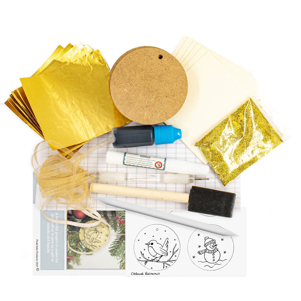 Gold Christmas bauble decoration metal embossing kit contents with foil, six MDF discs, tools, glitter, templates and instructions.