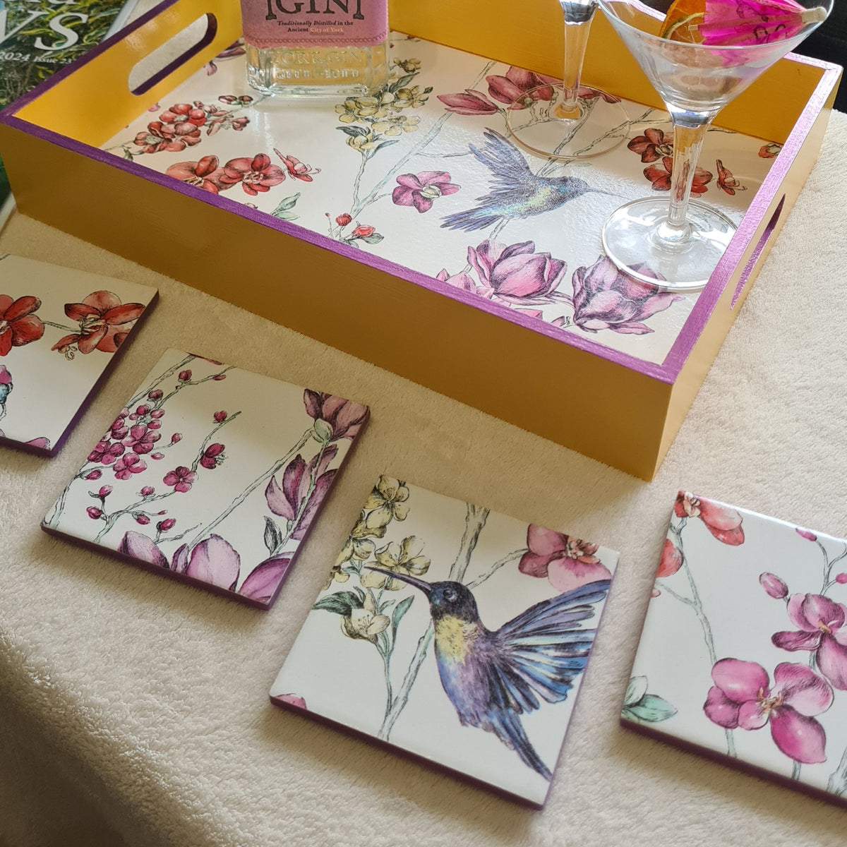 Matching hummingbird floral ceramic coasters with metallic violet edging.  Available separately.