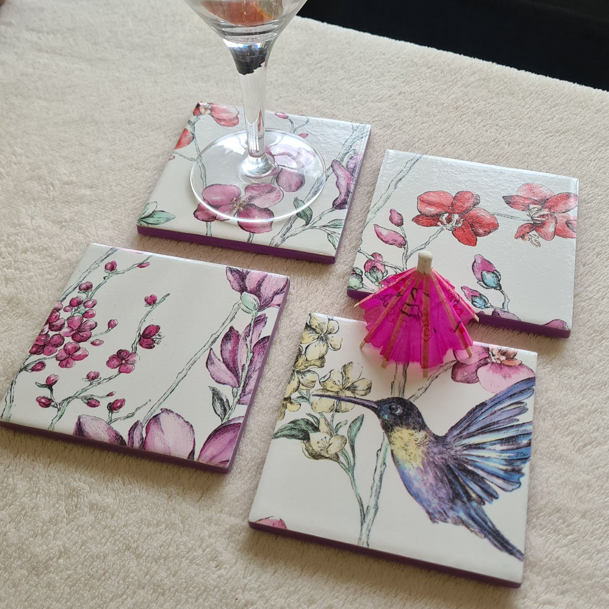 custom made ceramic coasters using customer's own Hummingbird wallpaper, created by The Furniture Bureau.