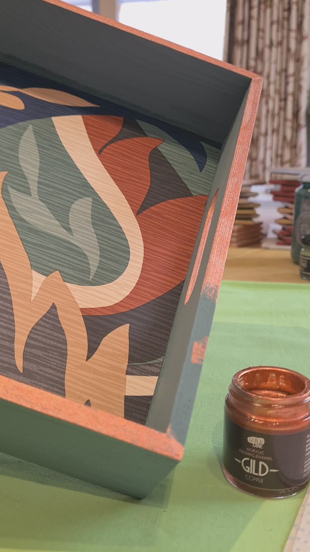 video showing ease of applying copper gild enamel with an artist's brush to a painted wooden serving tray.