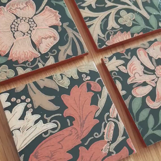 Video of set of four handmade William Morris Compton ceramic coasters showing the intricate botanical design, hand-finished metallic edging and handcrafted finish.