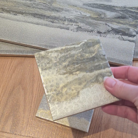 Video showing ceramic placemats and coasters created from customer's wallpaper by The Furniture Bureau.