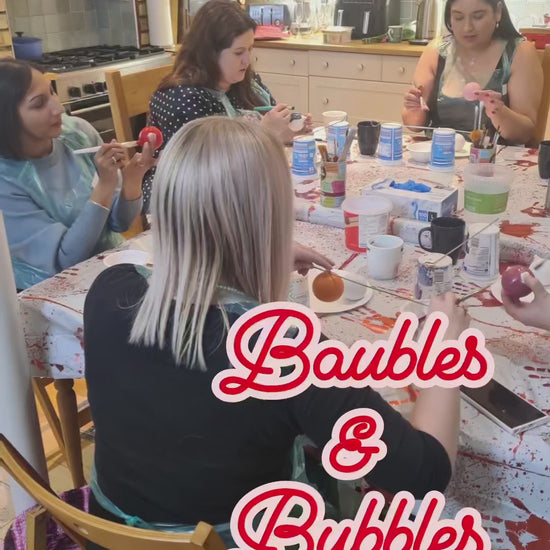 Video of a private Baubles and Bubbles paint party showing fun and festive creativity.