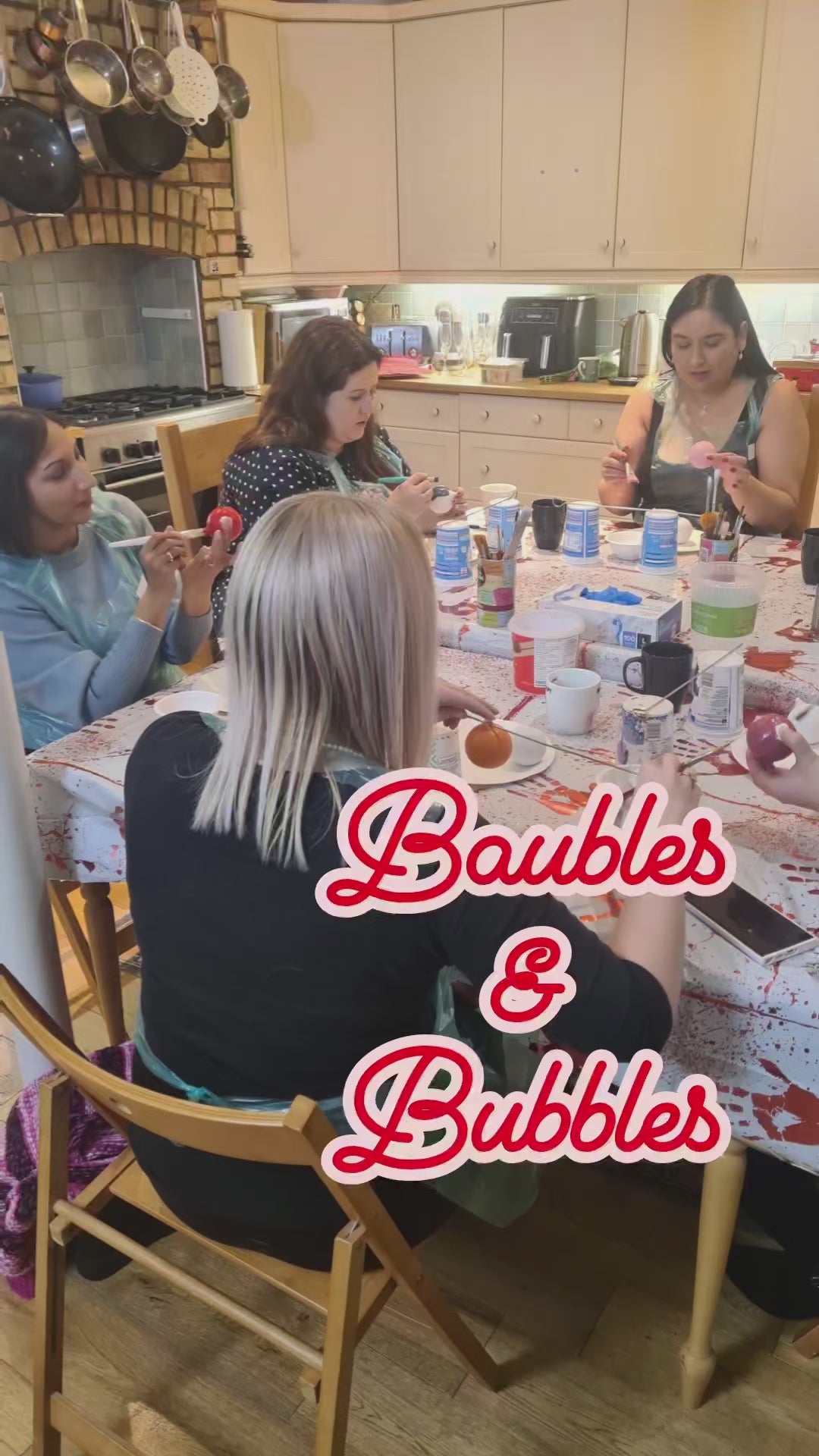 Video of a private Baubles and Bubbles paint party showing fun and festive creativity.