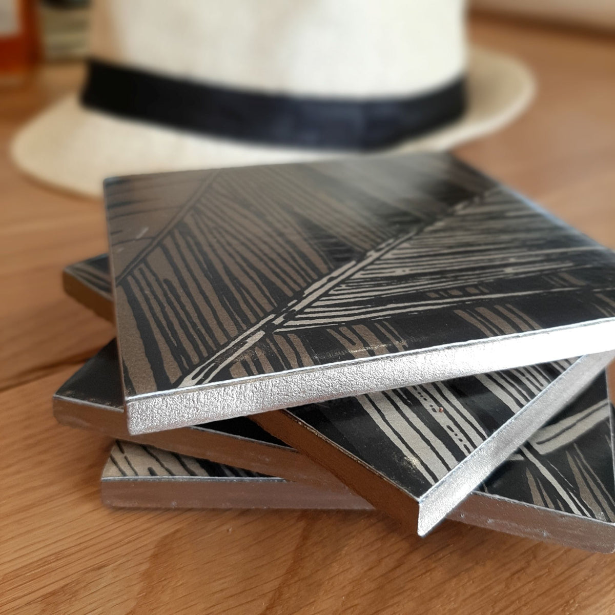 Guild Lane GILD Silver metallic paint used to add silver detailing to handcrafted ceramic coasters.