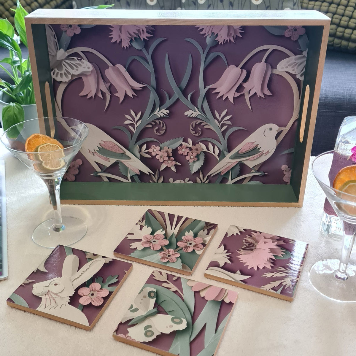 Handmade Woodland ceramic coasters and matching tray styled as unique coffee table accessories.